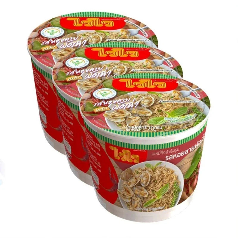 WAIWAI instant clam stir-fry noodles in a bowl with chili flavor, ready to eat, showcasing the dry noodle dish with vibrant ingredients.