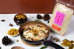 Dry Chinese noodles from Rabbit Brand, 400g package, showing uncooked noodles in a clear view.