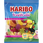 Assorted Haribo Tropifrutti jelly candies in bright, colorful fruit shapes and flavors on a white background.