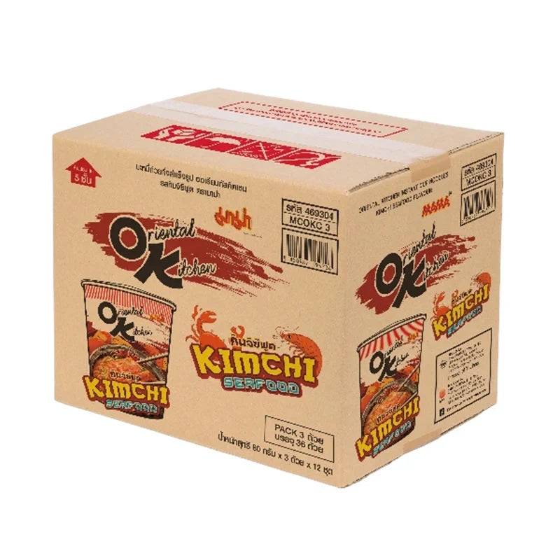 Mama Oriental Kitchen Instant Cup Noodles with Kimchi and Seafood, 80g, dry grocery product, in a cup with visible noodles and ingredients.