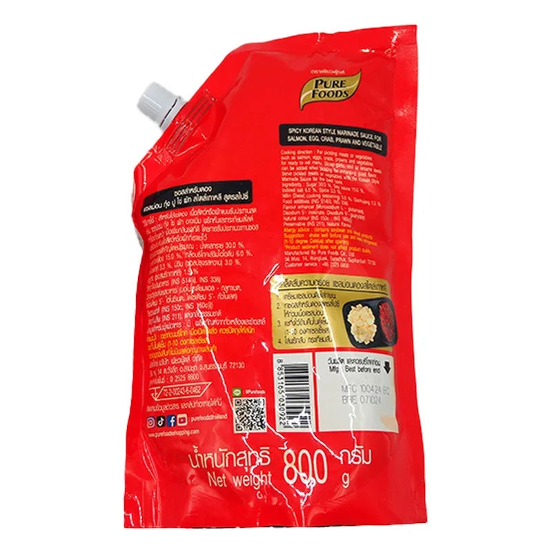 Pure Foods spicy marinade sauce in 800g bottle, rich in flavor, ideal for grilling and cooking, from Pure Foods dry grocery collection.