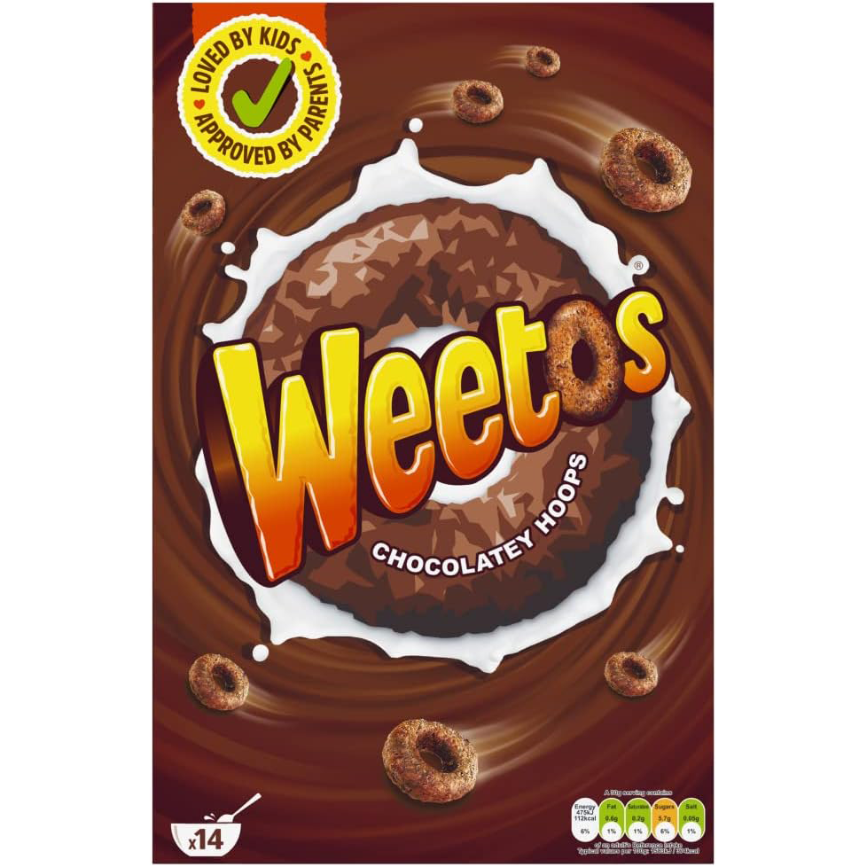 Bowl of Weetabix Weetos chocolate hoops cereal with milk in a white bowl, showcasing the crispy chocolate-flavored breakfast cereal.