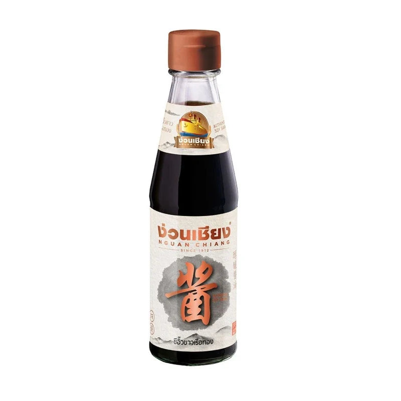 Nguan Chiang Light Soy Sauce Golden Boat 200ml bottle, traditional dry grocery condiment with clear, rich soy sauce liquid.
