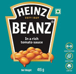 Heinz Baked Beans in Tomato Sauce gluten-free cans, 415g each, stacked in a pack of six for dry grocery shopping.