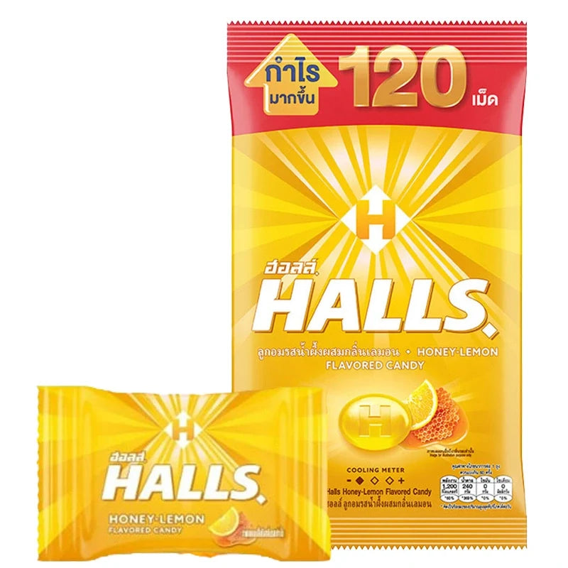 Halls Candy Honey Lemon lozenges in a clear plastic bag, featuring bright yellow and honey-colored candies for soothing relief.