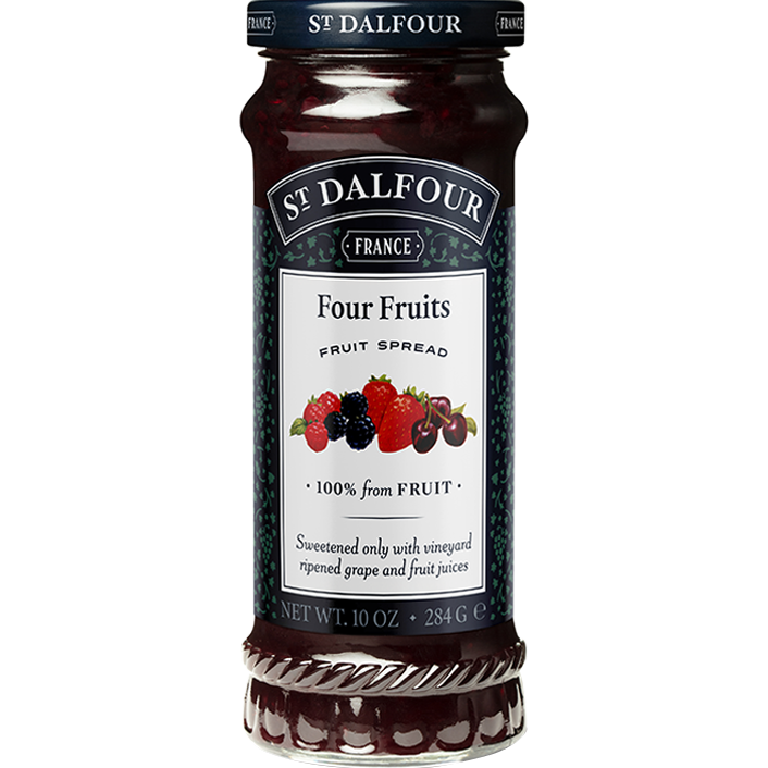 Jar of St. Dalfour Four Fruit preserves with visible fruit pieces and label, showcasing a natural fruit spread.