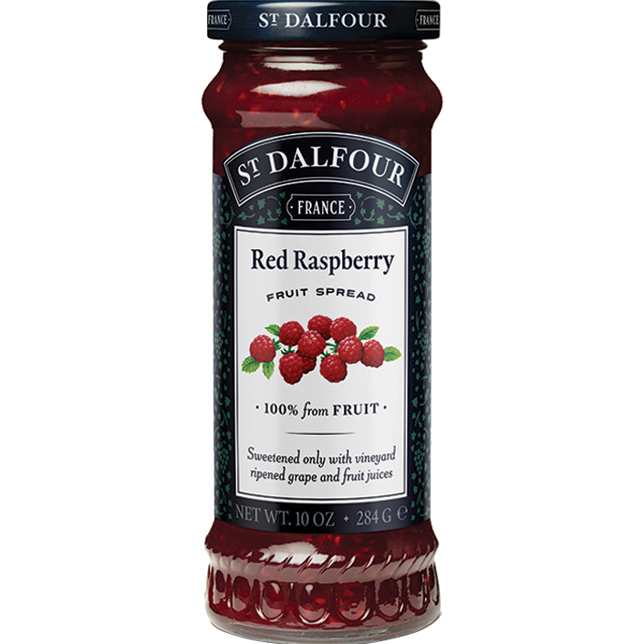 Jar of St. Dalfour Raspberry Grocery jam with fresh raspberries and a clear label, showcasing the vibrant red berry spread.