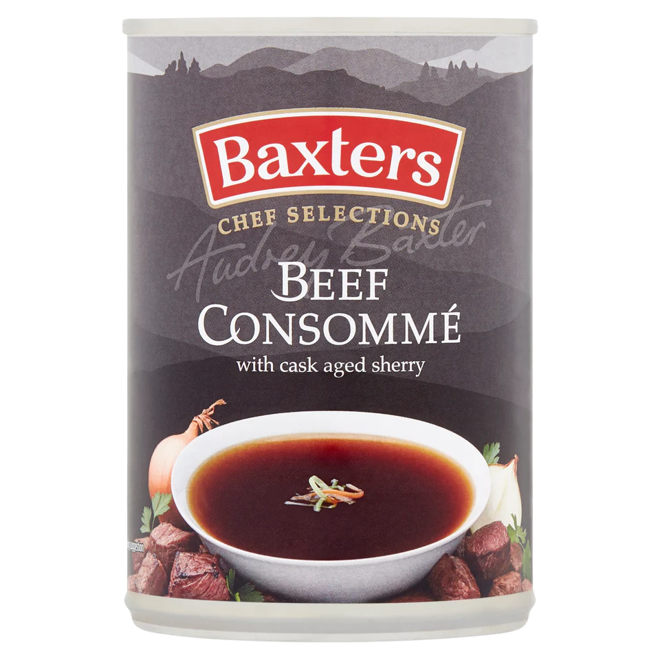 Baxters Luxury Beef Consomme Soup in a bowl, clear broth with beef and vegetables, served in a white dish.