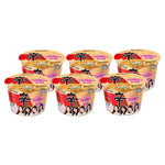 Nongshim Toomba spicy and creamy instant noodle cup, 113g, showing the ready-to-eat noodles in a disposable cup.