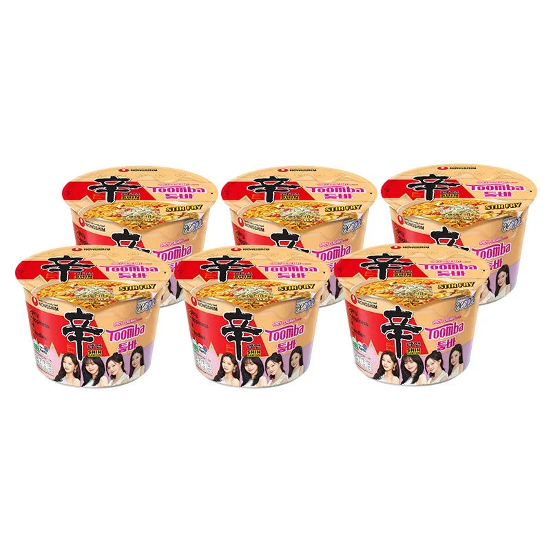 Nongshim Toomba spicy and creamy instant noodle cup, 113g, showing the ready-to-eat noodles in a disposable cup.