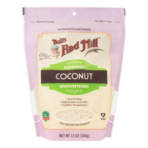Unsweetened shredded coconut from Bob's Red Mill, healthy grocery product, showing shredded coconut in a clear container.