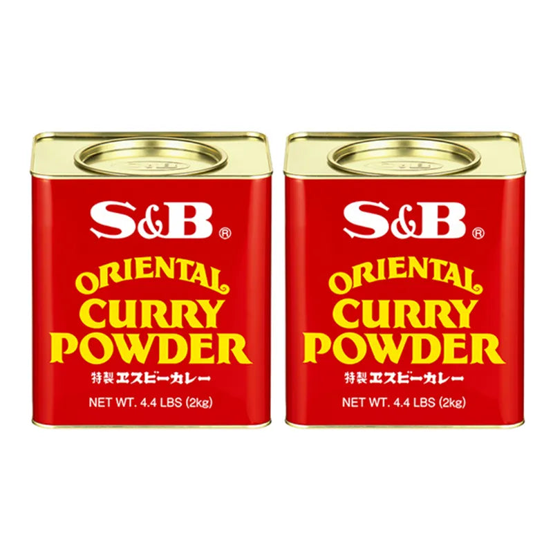 S & B Oriental Curry Powder Mix with turmeric in a clear glass jar, showing the vibrant yellow spice blend.
