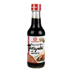 Kikkoman Teriyaki Japanese Grill Sauce bottle with label, ideal for Asian cuisine and grilling recipes.