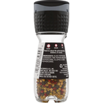 McCormick Peppercorn Medley grinder with a clear glass container and black plastic lid, filled with mixed peppercorns.