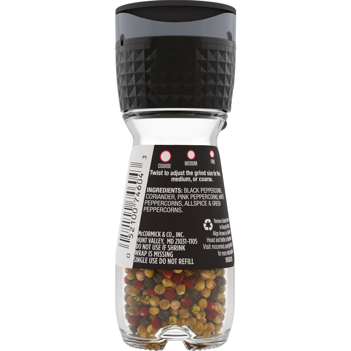 McCormick Peppercorn Medley grinder with a clear glass container and black plastic lid, filled with mixed peppercorns.