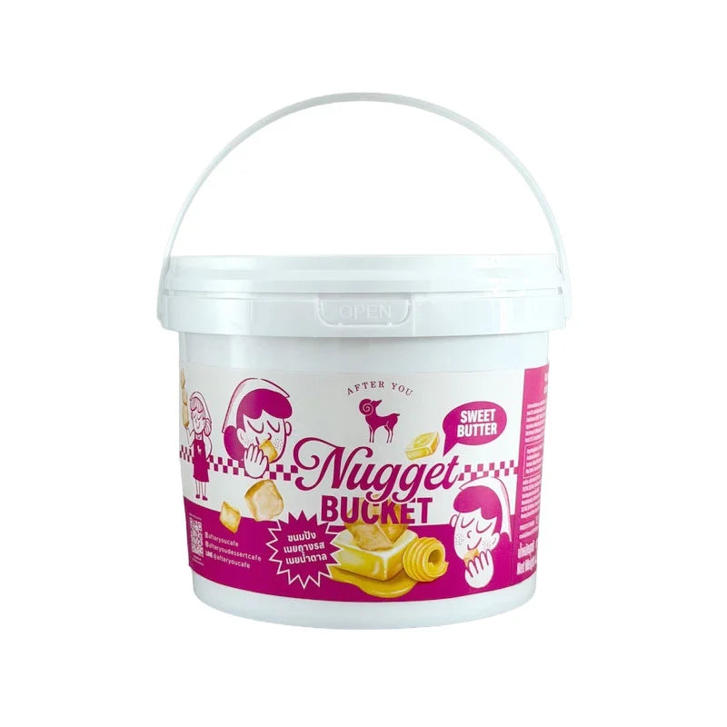 After YOU Nugget Bucket Sweet Butter snack with golden, crunchy confectionery nuggets in a 250g container.
