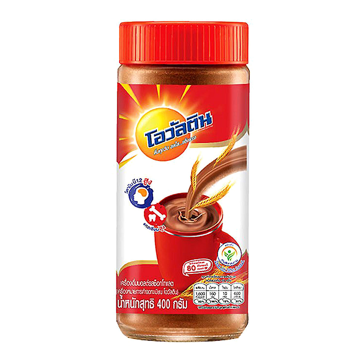 Ovaltine Classic drink in a glass with a spoon, showcasing the malted chocolate beverage by Ovaltine.