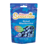 Dried blueberries from Nature's Sensation in a clear bowl, showcasing the vibrant blue color and textured surface of the snack.