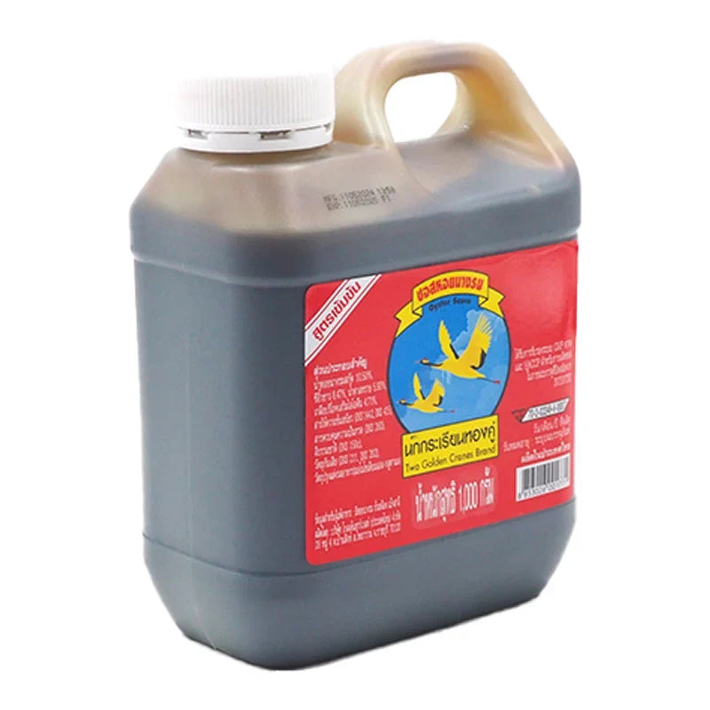 TWO Golden Crones Oyster Sauce 1kg jar, a key ingredient in Asian cuisine, shown in a clear container with label visible.