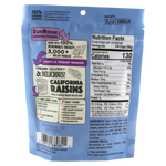 Sunridge Farms All Natural Yogurt Raisins in a clear bowl, showcasing glossy, plump raisins coated with yogurt for healthy snack options.