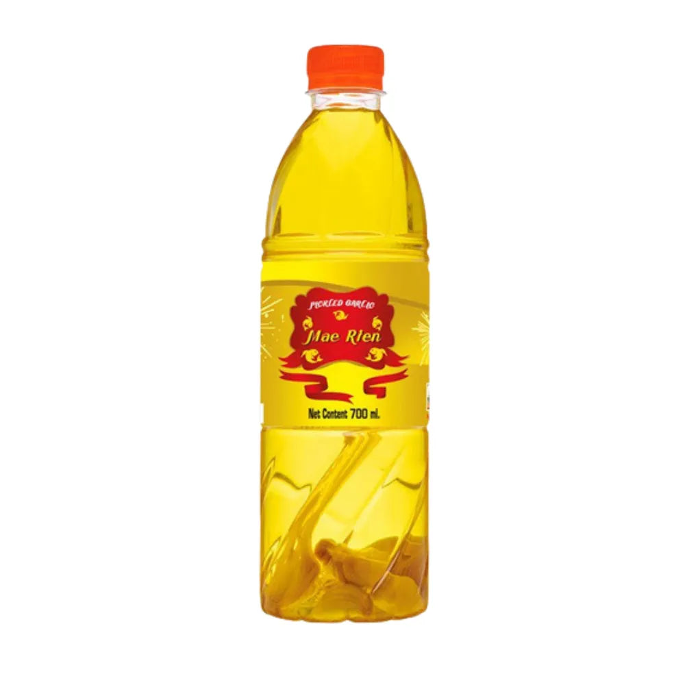 Plaramaerien garlic pickled juice bottle, 700ml, showing the clear liquid inside, part of a 12-pack in dry grocery packaging.