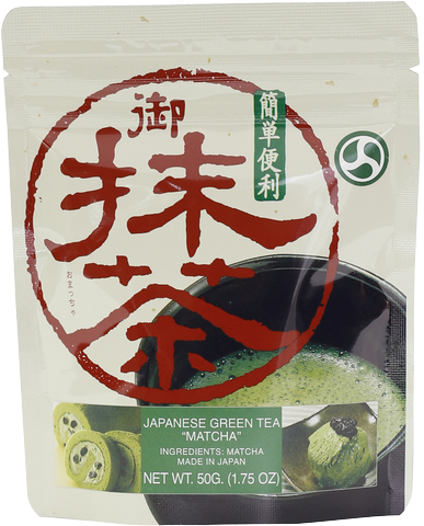 Makotoen Japanese green tea matcha drink in a clear glass, showcasing vibrant green tea color and frothy texture.