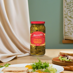 Sliced hot jalapeno peppers in a jar by Mezzetta, ready to add spicy flavor to sandwiches, salads, or dishes.