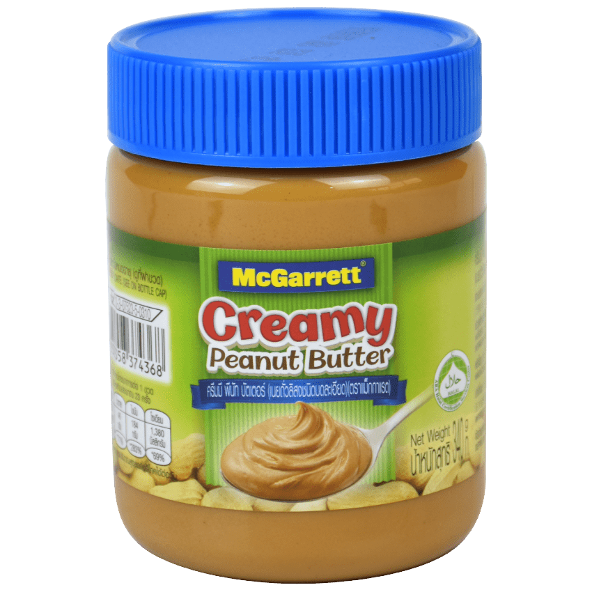 Creamy McGarrett Peanut Butter jar with label, smooth texture visible, in a grocery setting.
