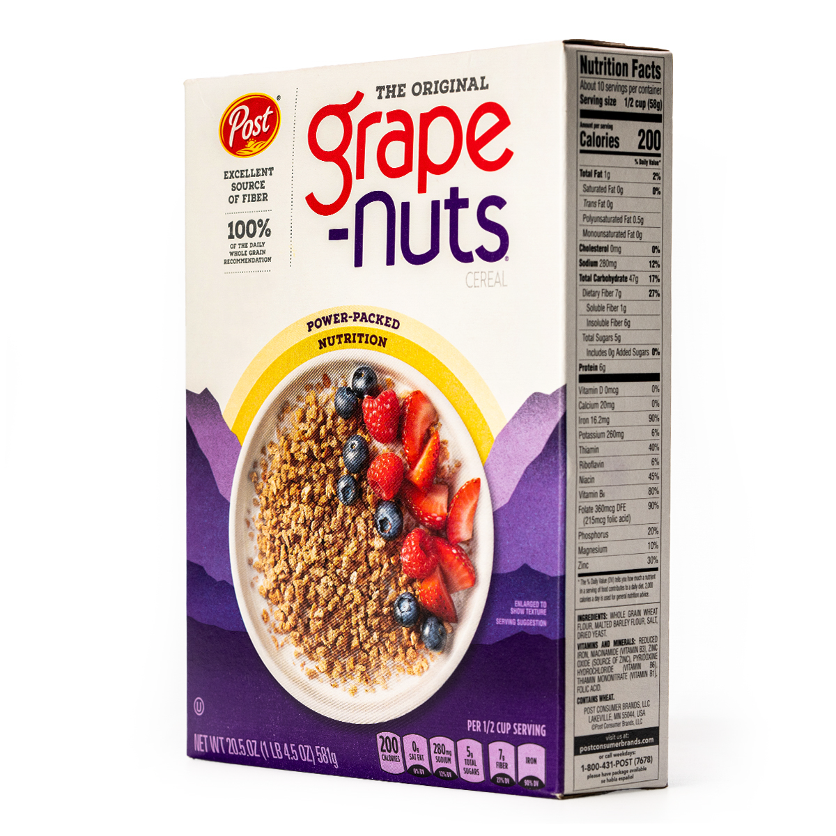 Bowl of Post Grape-Nuts cereal in a white bowl with milk, ready to eat, on a wooden table.