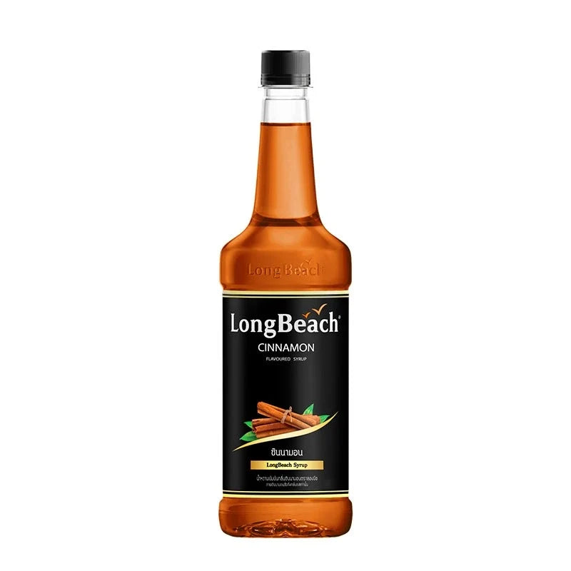 LongBeach Cinnamon Syrup bottle from dry grocery section, featuring a clear label and dark syrup inside.