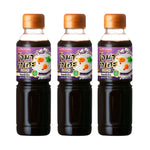 Three bottles of Omakase Japanese soy sauce, 200ml each, in a dry grocery setting, showcasing the sleek black label and packaging.