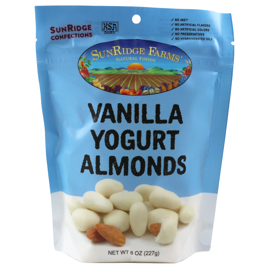 Sunridge Farms Yogurt Almonds, confectionery snack with roasted almonds coated in yogurt flavor, in a clear bowl.