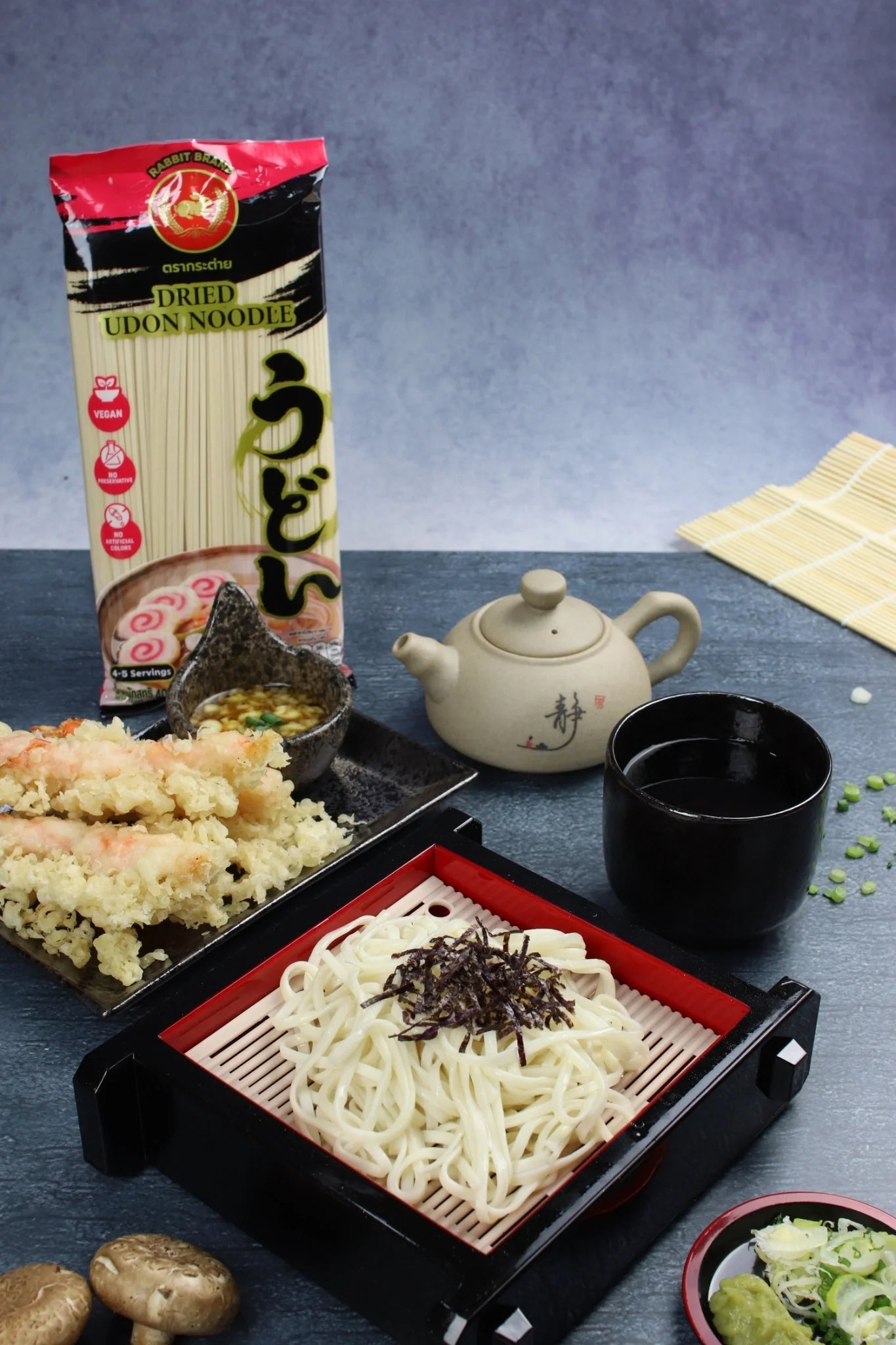 Dried Rabbit Brand Udon Noodles 400g in a clear package, showcasing thick, white Japanese-style wheat noodles.