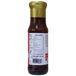 Jadjans Stir Fried Basil Sauce jar, showcasing vibrant basil and sauce ingredients, ideal for enhancing Asian dishes.