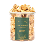 Cute Popcorn Peanut Butter confectionery snack in a colorful package, featuring popcorn and peanut butter flavor.