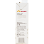 Glass of Pureharvest Original Rice Milk in a clear glass, showcasing its creamy, natural appearance.
