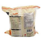 MAMA dried instant noodles Oriental Kitchen stir-fried salted flavor in a bowl, ready to eat, showcasing the product packaging.
