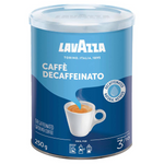 Ground Lavazza Dek coffee for brewing, showcasing the packaging and rich, dark coffee grounds in a natural setting.