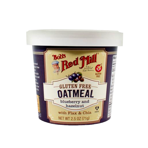 Bowl of Bob's Red Mill oatmeal with blueberries and hazelnuts, showcasing the fresh ingredients and hearty breakfast option.