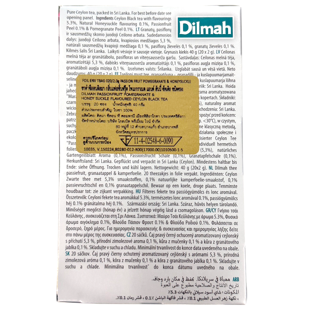 Dilmah Passion Fruit Pomegranate flavored drink in a clear glass, showcasing vibrant pink and orange hues.