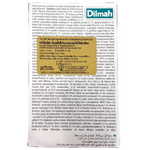 Dilmah Passion Fruit Pomegranate flavored drink in a clear glass, showcasing vibrant pink and orange hues.