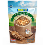 McGarrett Pinto dried beans in a clear grocery bag, showing the reddish-brown beans inside.
