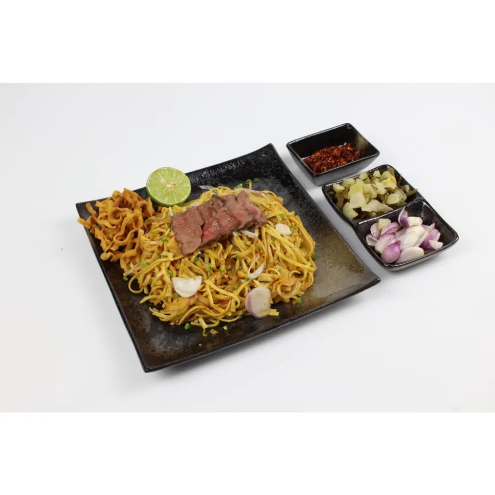 Rabbit Brand Khao SOI noodles 200g package, dry grocery product with colorful packaging and traditional Thai noodle design.