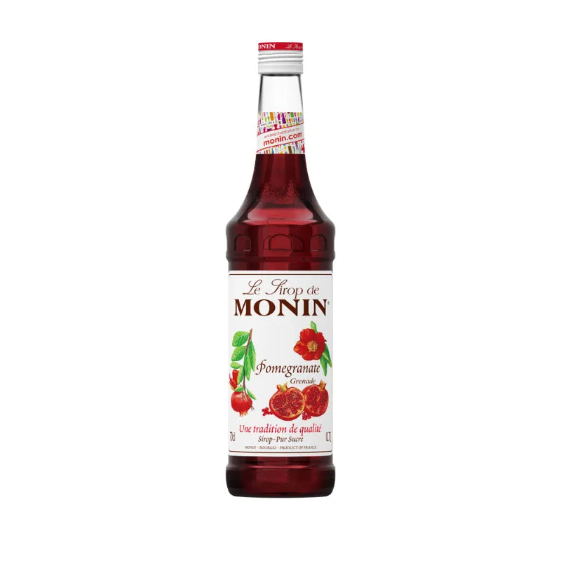 Bottle of MONIN Pomegranate Syrup 700ml for dry grocery, showing the label and clear bottle with red liquid inside.