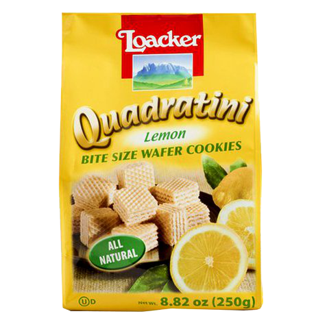 Loacker Quadratini Lemon confectionery snacks with lemon-flavored wafer cookies stacked in a clear container.