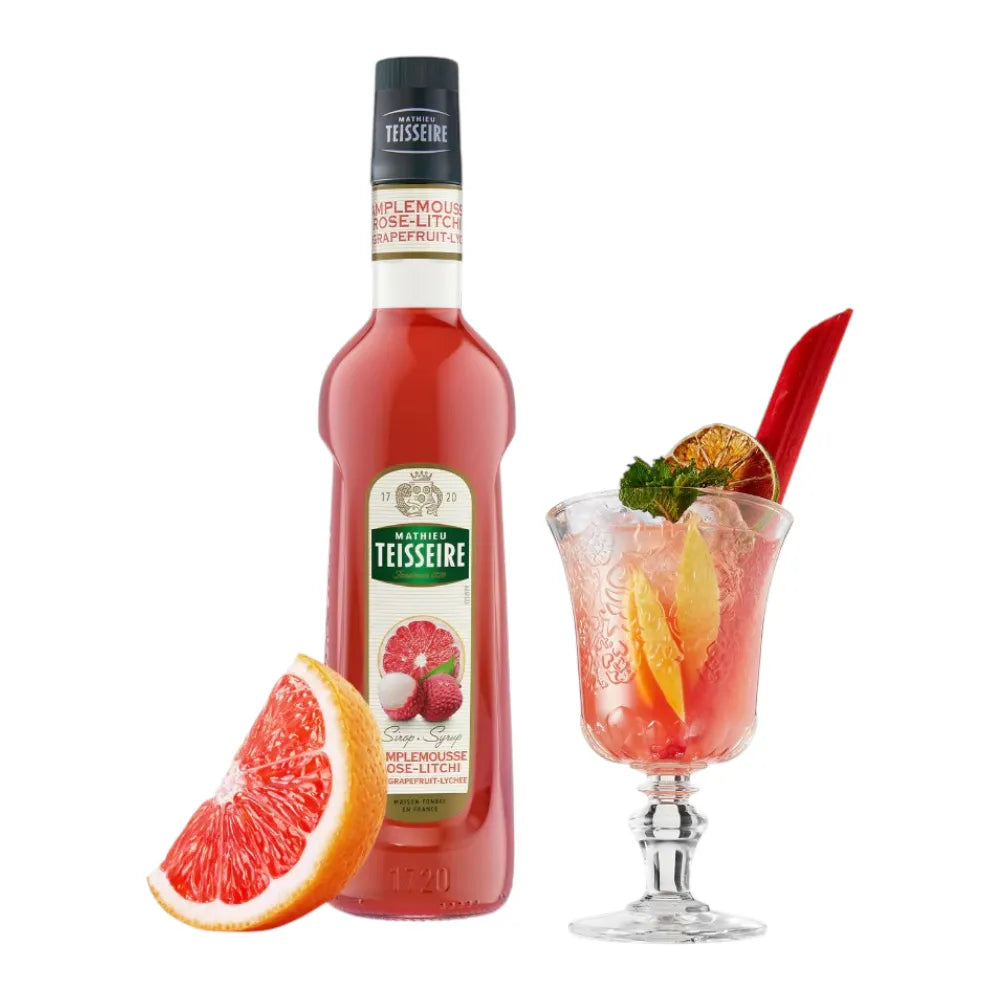 Mathieu Teisseire pink grapefruit and lychee syrup bottle in 700ml size, ready to add flavor to beverages and desserts.