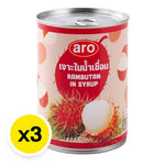 Cans of ARO Rambutan in syrup, 565g each, stacked in a row, showcasing the tropical fruit product from the dry grocery section.