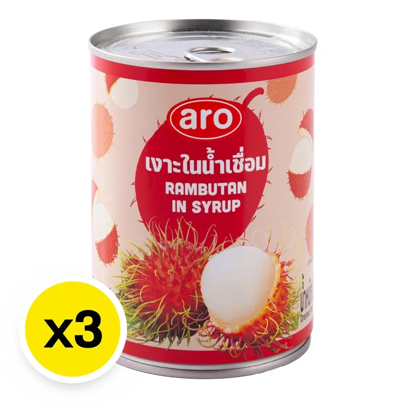 Cans of ARO Rambutan in syrup, 565g each, stacked in a row, showcasing the tropical fruit product from the dry grocery section.
