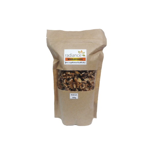 Radiance Wholefoods walnuts in a clear bowl, showcasing their natural, crunchy confectionery snack appearance.