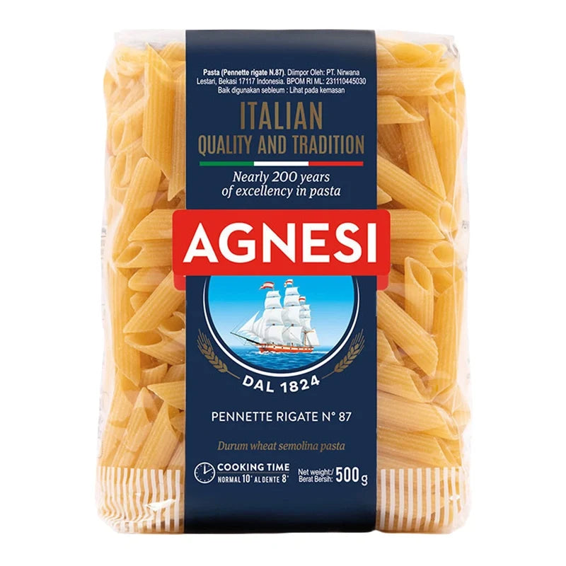 Agnesi Pennette Rigate No.87 pasta in a 500g dry grocery package, showcasing short, tube-shaped pasta from the Italian brand Agnesi
